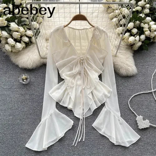 TAMBREET Mesh Sheer Tie Up Crop Tops Women Long Flare Sleeve V Neck Ruffle Tops and Blouse Summer See Through Sexy Casual Shirts Female